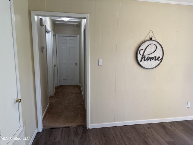 11086 E Taylor Rd, Gulfport, MS 39503 - hall featuring dark wood-type flooring and baseboards