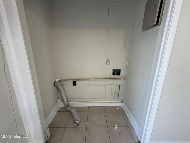 3435 Casa Grande Cir, Jackson, MS 39209 - washroom featuring electric dryer hookup, washer hookup, tile patterned floors, and baseboards