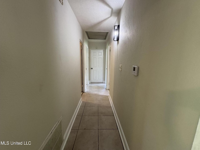 3435 Casa Grande Cir, Jackson, MS 39209 - corridor with light tile patterned flooring and baseboards
