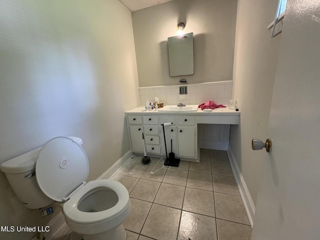 3435 Casa Grande Cir, Jackson, MS 39209 - bathroom with toilet, tile patterned flooring, and vanity