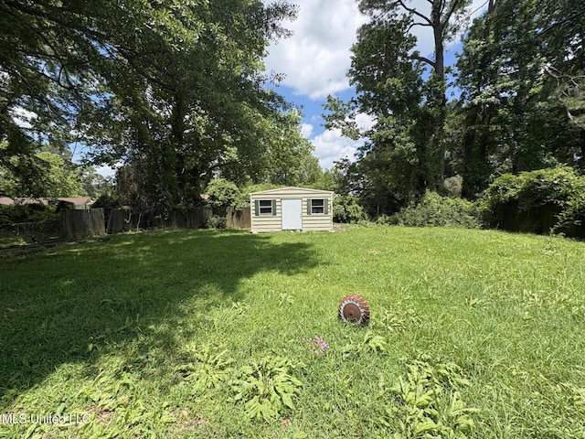 3435 Casa Grande Cir, Jackson, MS 39209 - view of yard with a storage unit and an outdoor structure