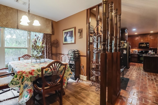 dining area with a chandelier