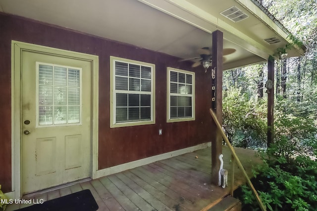 property entrance with a deck