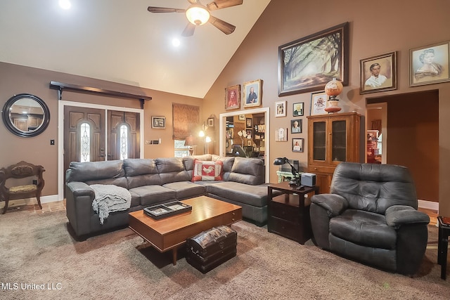 living room with carpet, ceiling fan, and high vaulted ceiling