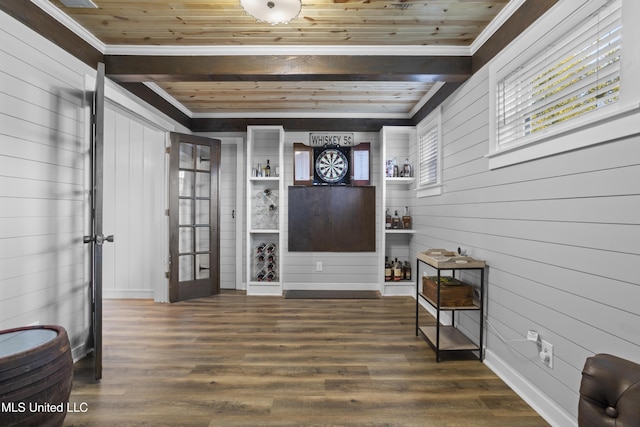 sitting room with beamed ceiling, wood finished floors, and wood ceiling