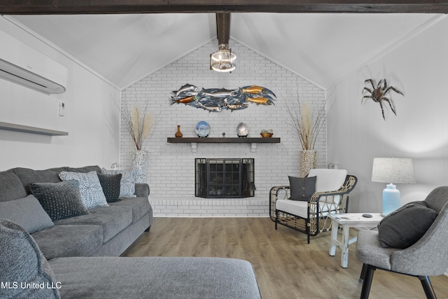 living room featuring vaulted ceiling with beams, a wall mounted AC, a brick fireplace, brick wall, and wood finished floors