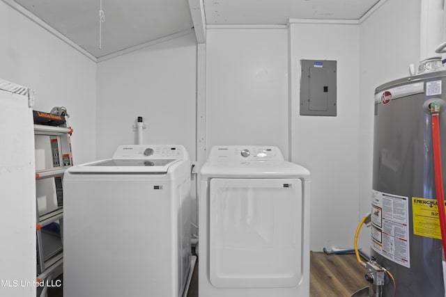 washroom featuring gas water heater, washing machine and dryer, laundry area, wood finished floors, and electric panel