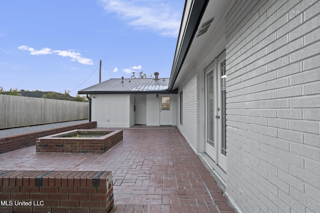 view of patio / terrace with fence