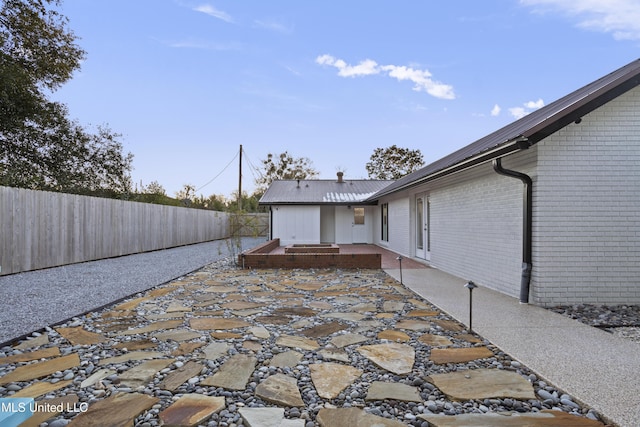 exterior space featuring a fenced backyard