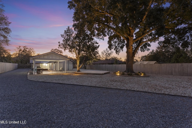 exterior space featuring a gazebo, a patio area, and a fenced backyard