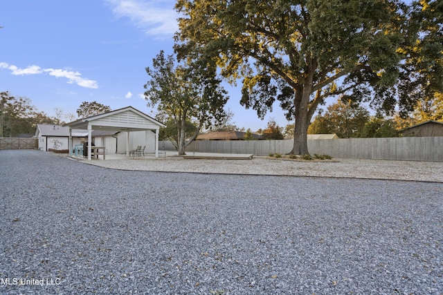 view of yard featuring a patio area and a fenced backyard