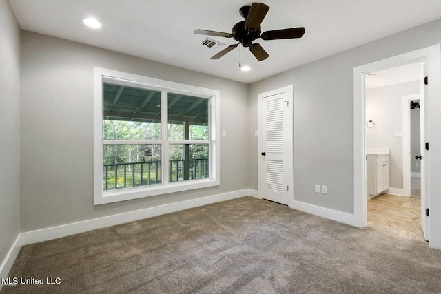 18153 Doc Lizana Rd, Gulfport, MS 39503 - unfurnished bedroom with visible vents, a closet, baseboards, recessed lighting, and carpet