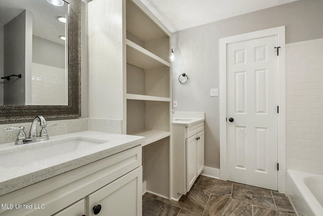 18153 Doc Lizana Rd, Gulfport, MS 39503 - bathroom featuring two vanities and a sink