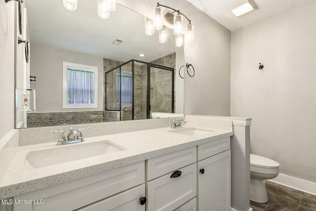 18153 Doc Lizana Rd, Gulfport, MS 39503 - full bath with toilet, double vanity, a sink, and a shower stall