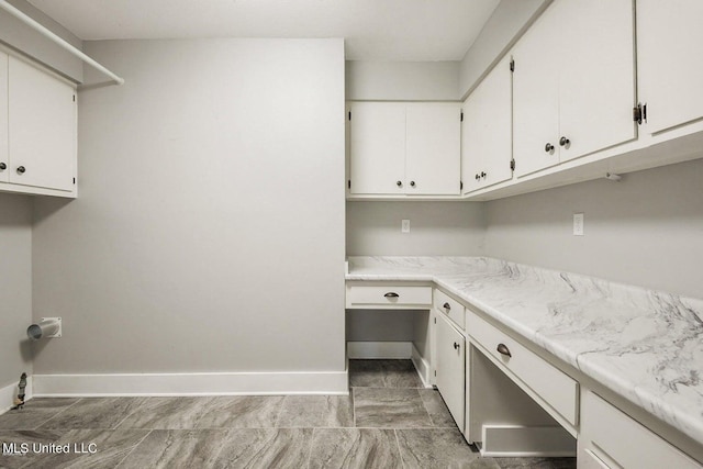 18153 Doc Lizana Rd, Gulfport, MS 39503 - laundry room featuring baseboards