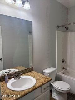 full bathroom featuring shower / tub combination, vanity, and toilet