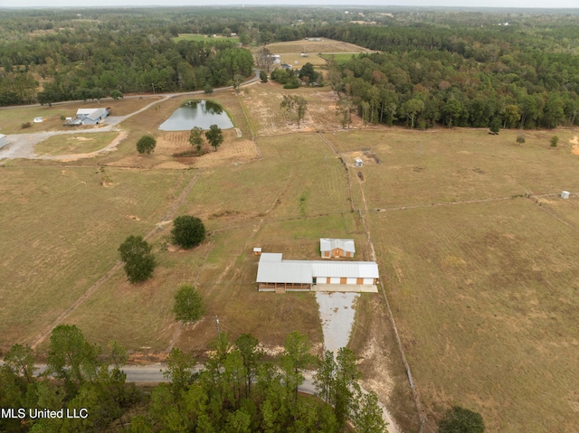 drone / aerial view with a water view and a rural view