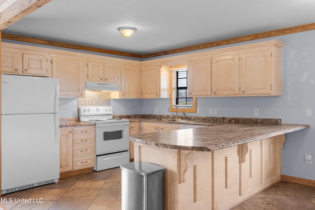 kitchen with sink, light brown cabinets, kitchen peninsula, and white appliances