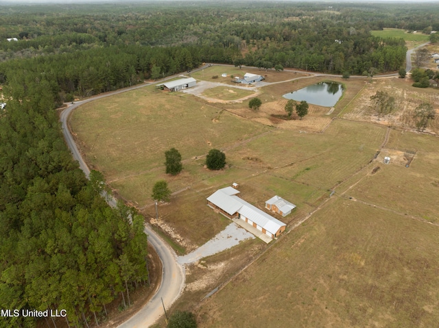 birds eye view of property featuring a water view and a rural view