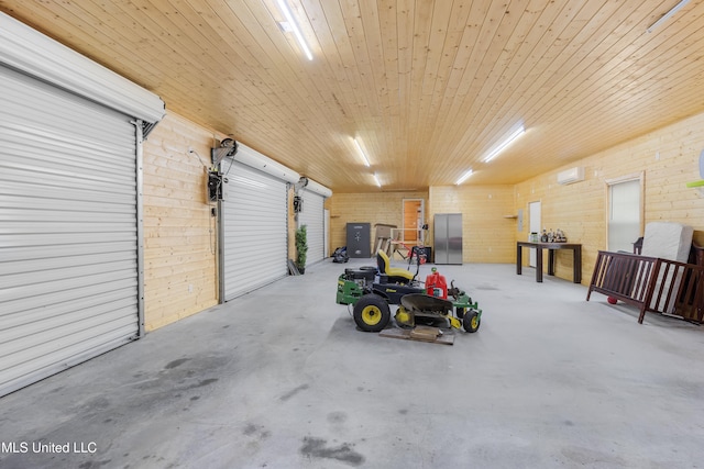 garage featuring a wall mounted AC, wooden ceiling, and stainless steel fridge