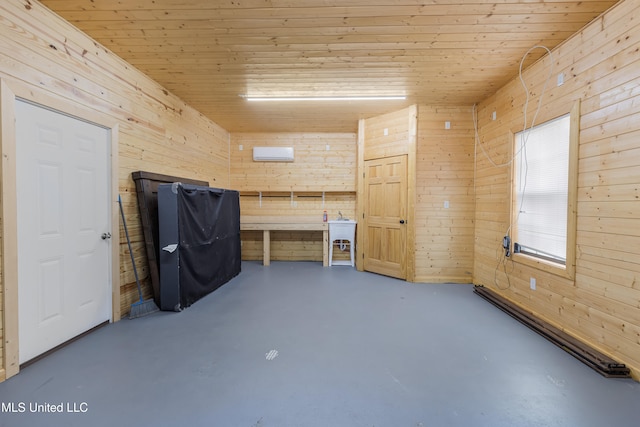 unfurnished bedroom featuring concrete flooring and wood walls