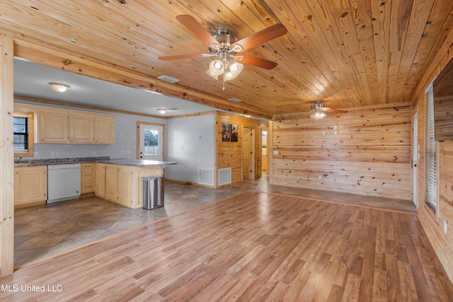 kitchen featuring white dishwasher, light hardwood / wood-style flooring, wooden ceiling, and wood walls