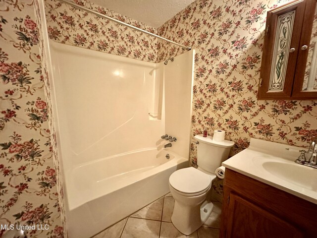 3427 Jr Davis Rd, Moss Point, MS 39562 - full bathroom with toilet, shower / tub combination, vanity, tile patterned flooring, and wallpapered walls