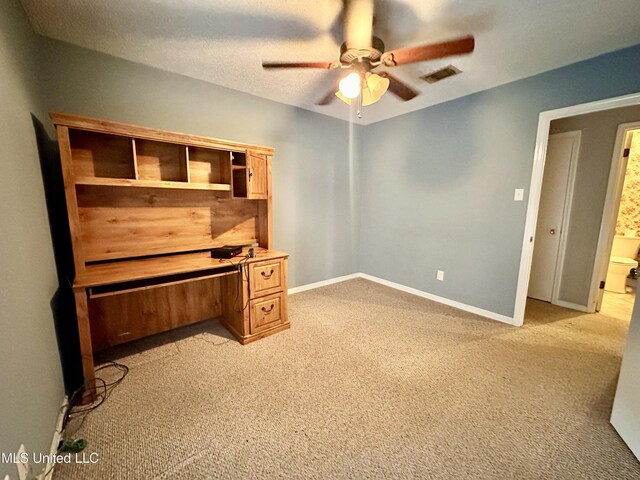 3427 Jr Davis Rd, Moss Point, MS 39562 - unfurnished office with light colored carpet, baseboards, a ceiling fan, and visible vents