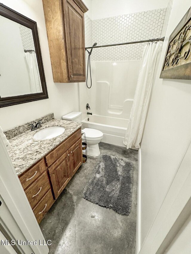 full bath featuring shower / tub combo, vanity, and toilet