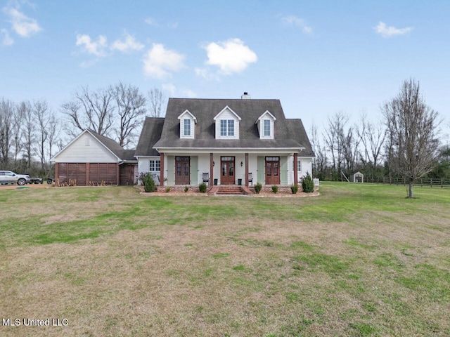 cape cod house with a front lawn and a porch