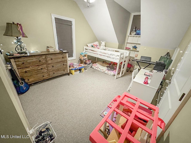 bedroom featuring carpet floors and vaulted ceiling