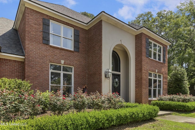 340 Sherborne Pl, Flowood, MS 39232 - view of front facade featuring roof with shingles and brick siding