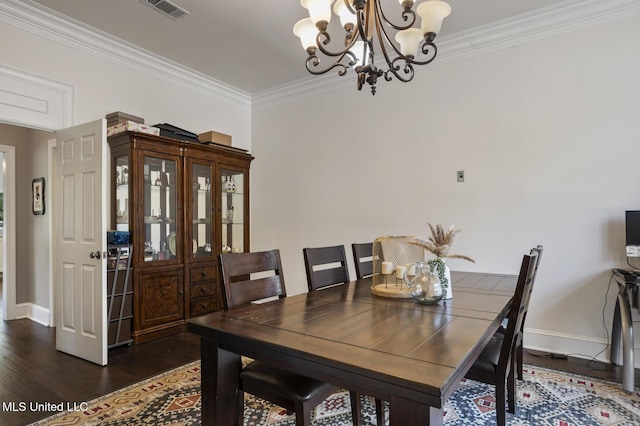 340 Sherborne Pl, Flowood, MS 39232 - dining room with a chandelier, dark wood-style floors, crown molding, and baseboards
