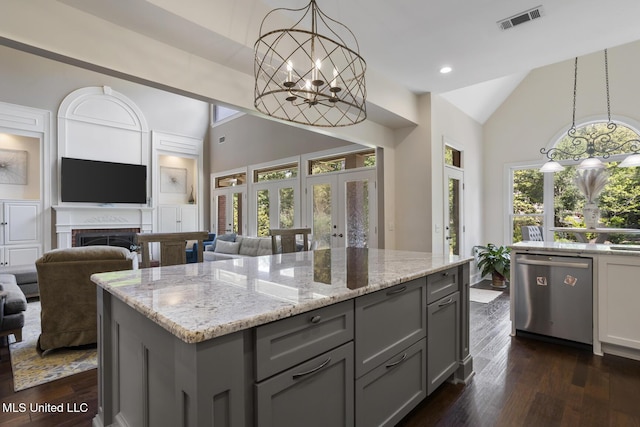 340 Sherborne Pl, Flowood, MS 39232 - kitchen featuring dishwasher, gray cabinetry, high vaulted ceiling, a chandelier, and light stone countertops