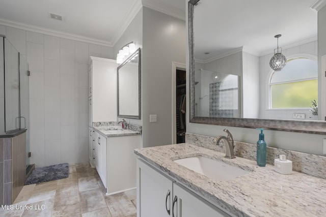 340 Sherborne Pl, Flowood, MS 39232 - full bathroom with ornamental molding, a shower stall, and two vanities