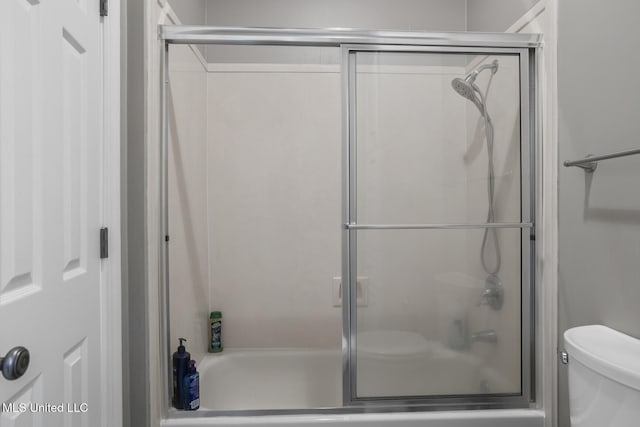340 Sherborne Pl, Flowood, MS 39232 - full bathroom featuring toilet and shower / bath combination with glass door