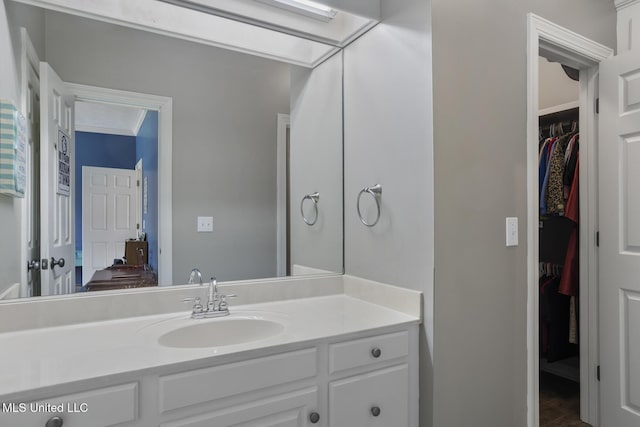 340 Sherborne Pl, Flowood, MS 39232 - bathroom featuring vanity and a spacious closet