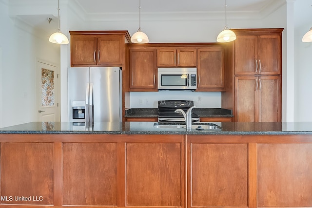 kitchen featuring brown cabinets, stainless steel appliances, ornamental molding, and a sink