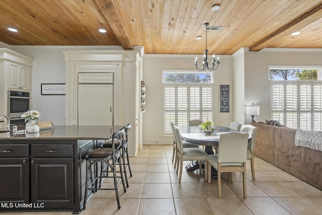 dining area featuring light tile patterned flooring, a notable chandelier, ornamental molding, and wood ceiling