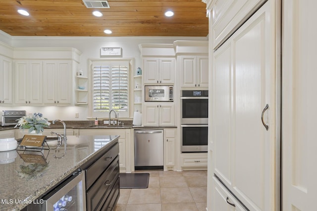 kitchen featuring visible vents, open shelves, a sink, wine cooler, and stainless steel appliances