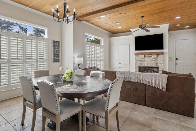 dining area featuring ornamental molding, ceiling fan with notable chandelier, light tile patterned flooring, and wooden ceiling