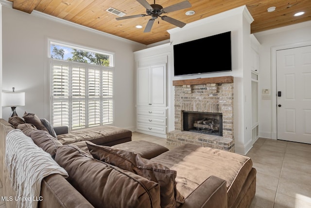 living area featuring visible vents, wood ceiling, light tile patterned flooring, and a fireplace