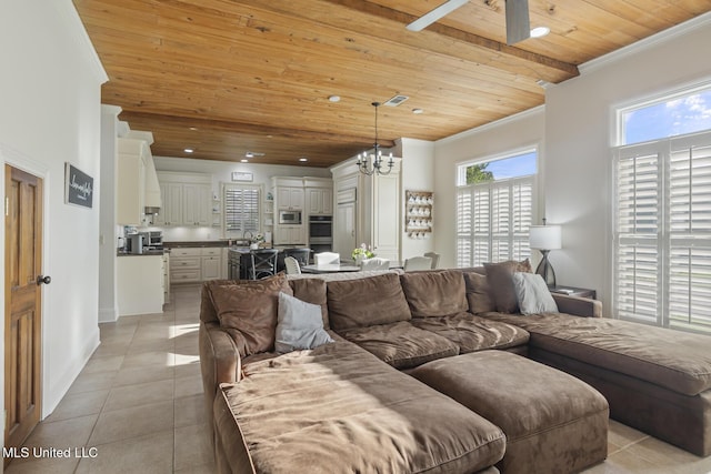 living area featuring light tile patterned floors, wood ceiling, crown molding, and ceiling fan with notable chandelier