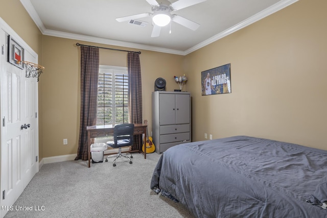 bedroom with carpet floors, ornamental molding, baseboards, and ceiling fan