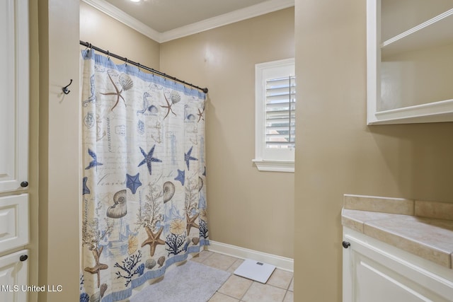 bathroom featuring a shower with shower curtain, tile patterned floors, ornamental molding, and baseboards