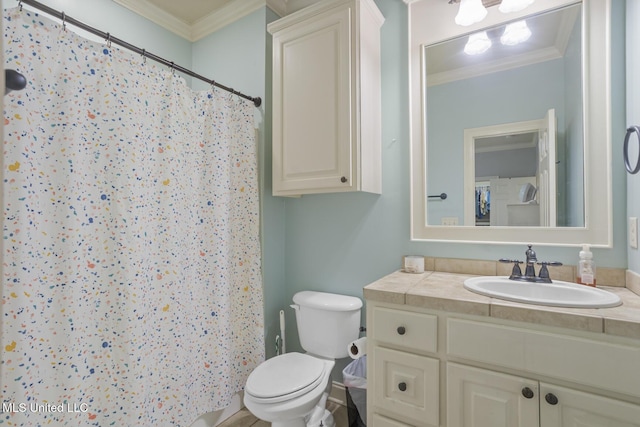 bathroom with toilet, ornamental molding, curtained shower, and vanity
