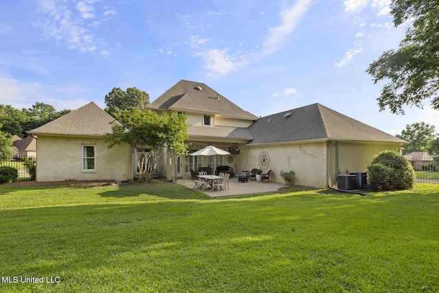 back of property with central air condition unit, fence, a patio, and stucco siding