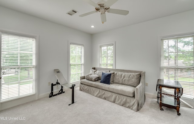 107 Chadwyck Ct, Madison, MS 39110 - living area featuring plenty of natural light, a ceiling fan, carpet flooring, and baseboards