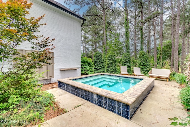 107 Chadwyck Ct, Madison, MS 39110 - view of pool featuring an in-ground hot tub and a patio