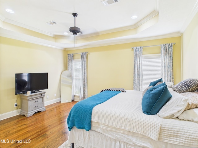 143 Charlton Dr, Madison, MS 39110 - bedroom featuring a tray ceiling, wood finished floors, crown molding, recessed lighting, and a ceiling fan